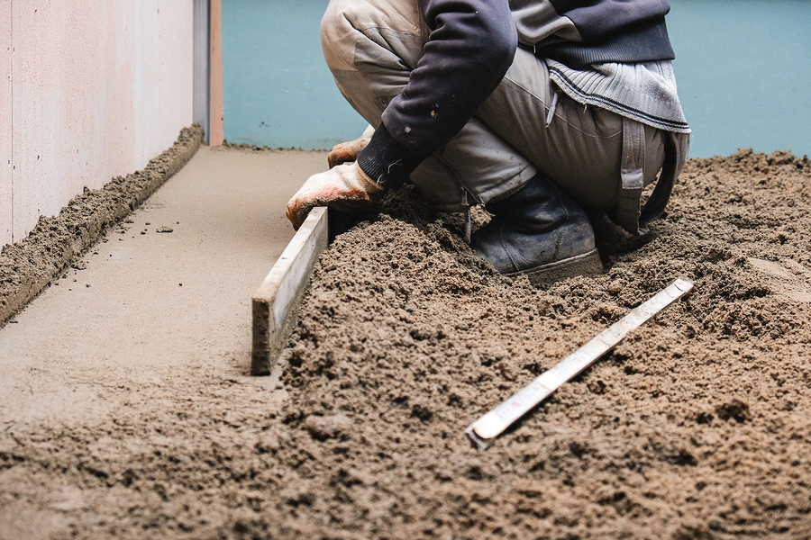 Builders Pour Concrete In The Shop At The Factory Home,